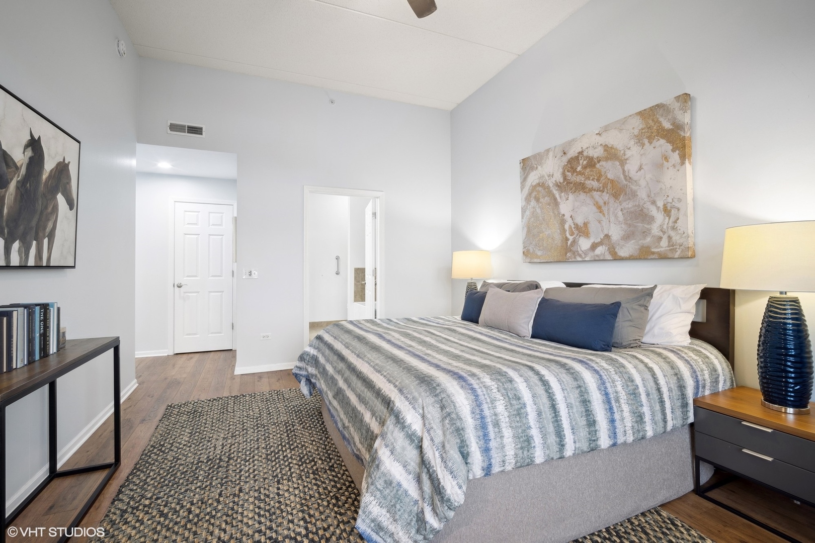 799 Graceland Avenue, Unit 502A Des Plaines, IL 60016 - Photo 22 of 31 a bedroom with bed and night stand