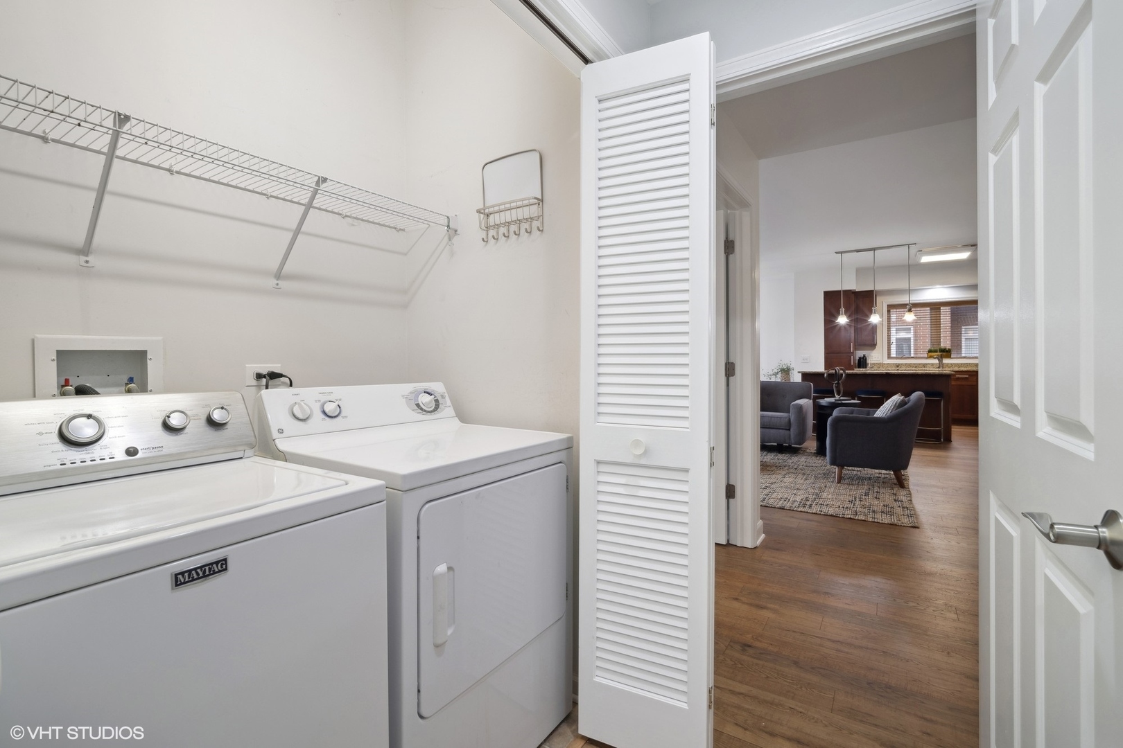 799 Graceland Avenue, Unit 502A Des Plaines, IL 60016 - Photo 29 of 31 a view of washer and dryer with bathroom in the background