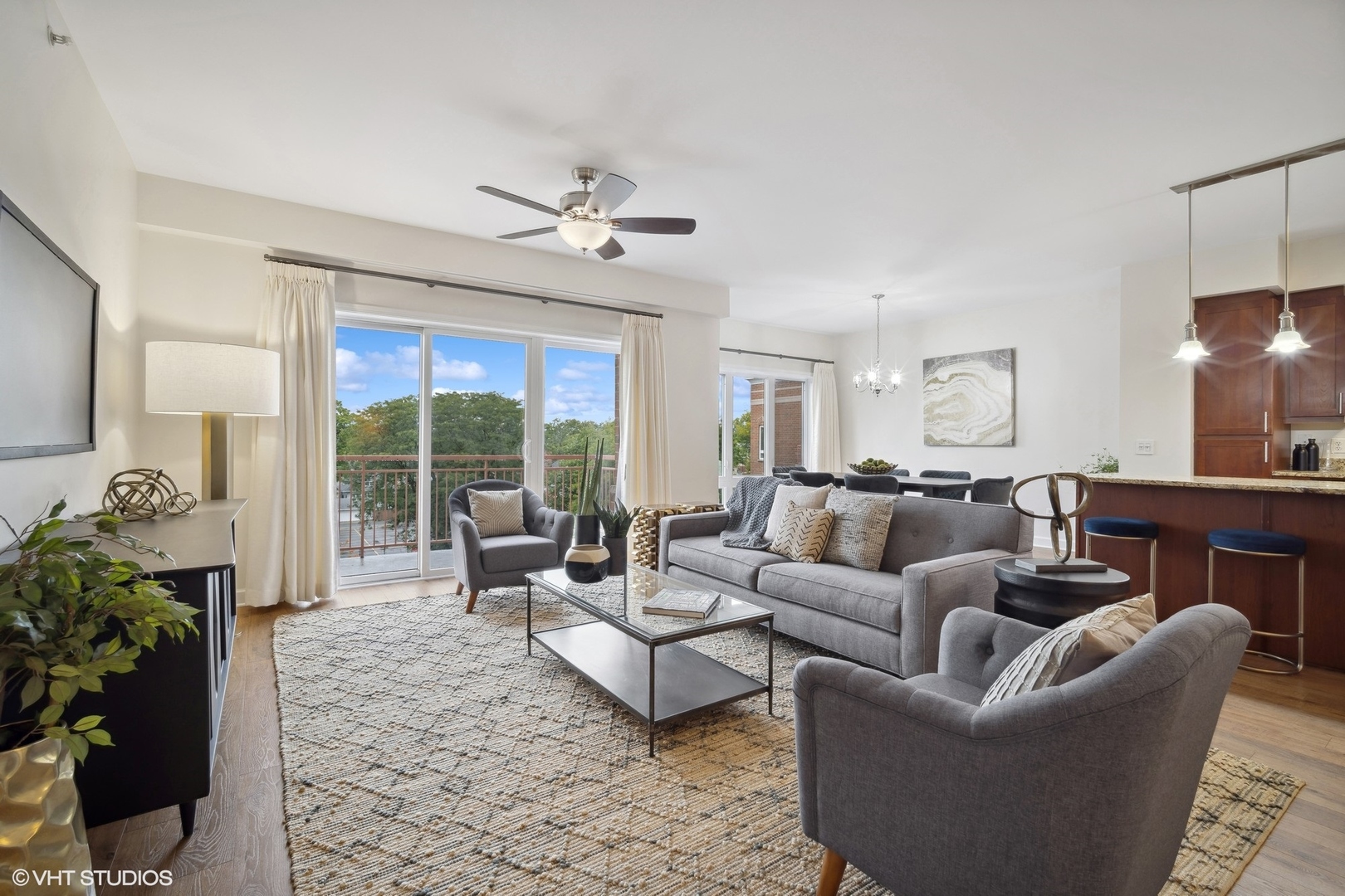 799 Graceland Avenue, Unit 502A Des Plaines, IL 60016 - Photo 6 of 31 a living room with furniture and a large window
