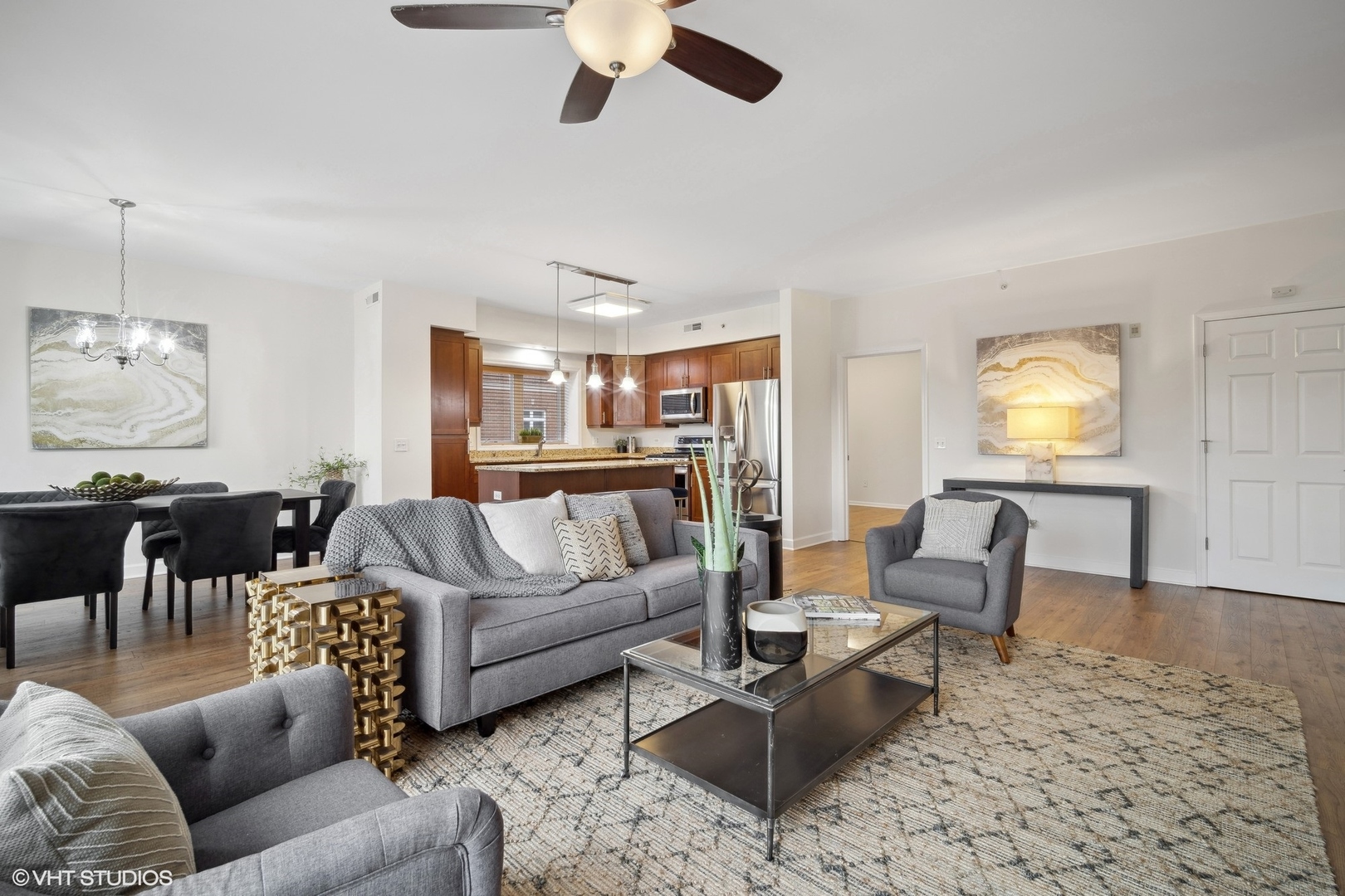 799 Graceland Avenue, Unit 502A Des Plaines, IL 60016 - Photo 8 of 31 a living room with furniture and wooden floor