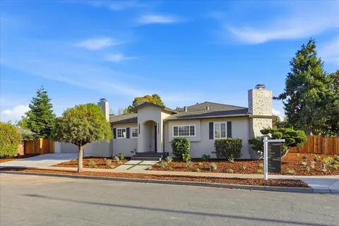 a front view of a house with a porch