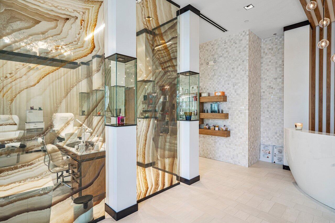 16467 Brookfield Estates Way Delray Beach, FL 33446 - Photo 62 of 78 a view of walk in closet with clothes and shoes