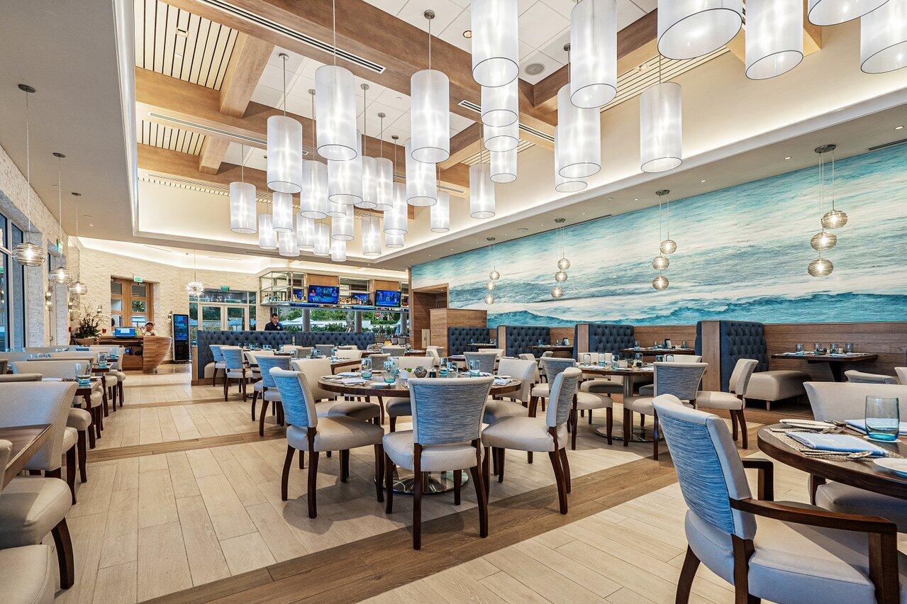 16467 Brookfield Estates Way Delray Beach, FL 33446 - Photo 72 of 78 a group of people sitting in living room