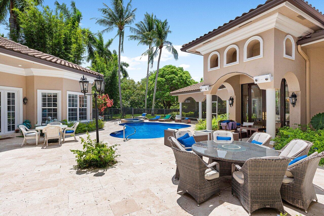 16467 Brookfield Estates Way Delray Beach, FL 33446 - Photo 8 of 78 a view of a house with backyard and sitting area