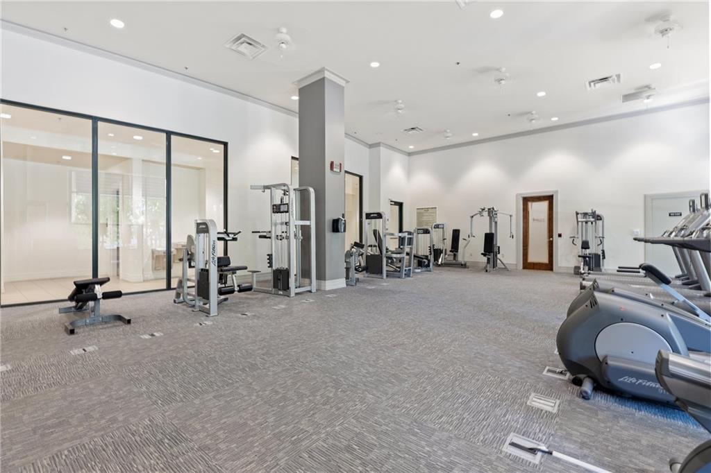 3040 Peachtree Road, Unit 1205 Atlanta, GA 30305 - Photo 18 of 43 a view of a room with gym equipment
