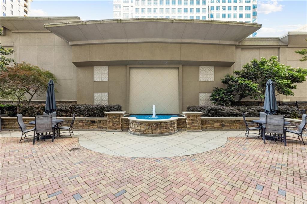 3040 Peachtree Road, Unit 1205 Atlanta, GA 30305 - Photo 23 of 43 a view of a house with sitting area