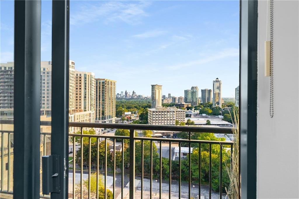 3040 Peachtree Road, Unit 1205 Atlanta, GA 30305 - Photo 7 of 43 a city view from a balcony