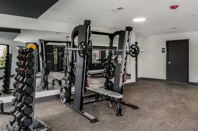 a view of a room with gym equipment