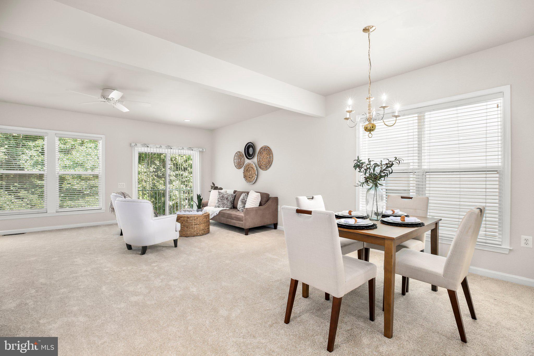 14 Sugargrove Court Fredericksburg, VA 22406 - Photo 13 of 63 a living room with furniture and a chandelier