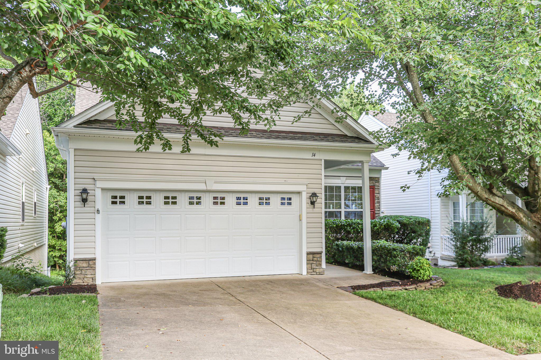 14 Sugargrove Court Fredericksburg, VA 22406 - Photo 2 of 63 a front view of a house with garden