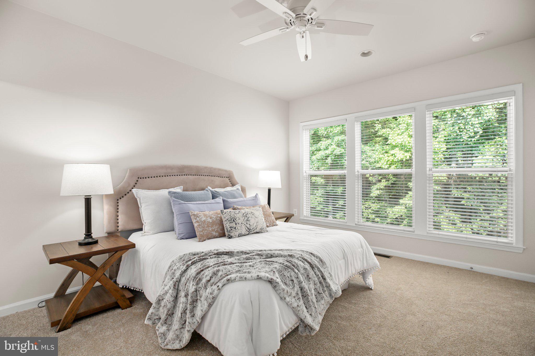 14 Sugargrove Court Fredericksburg, VA 22406 - Photo 21 of 63 a bedroom with a bed and a lamp