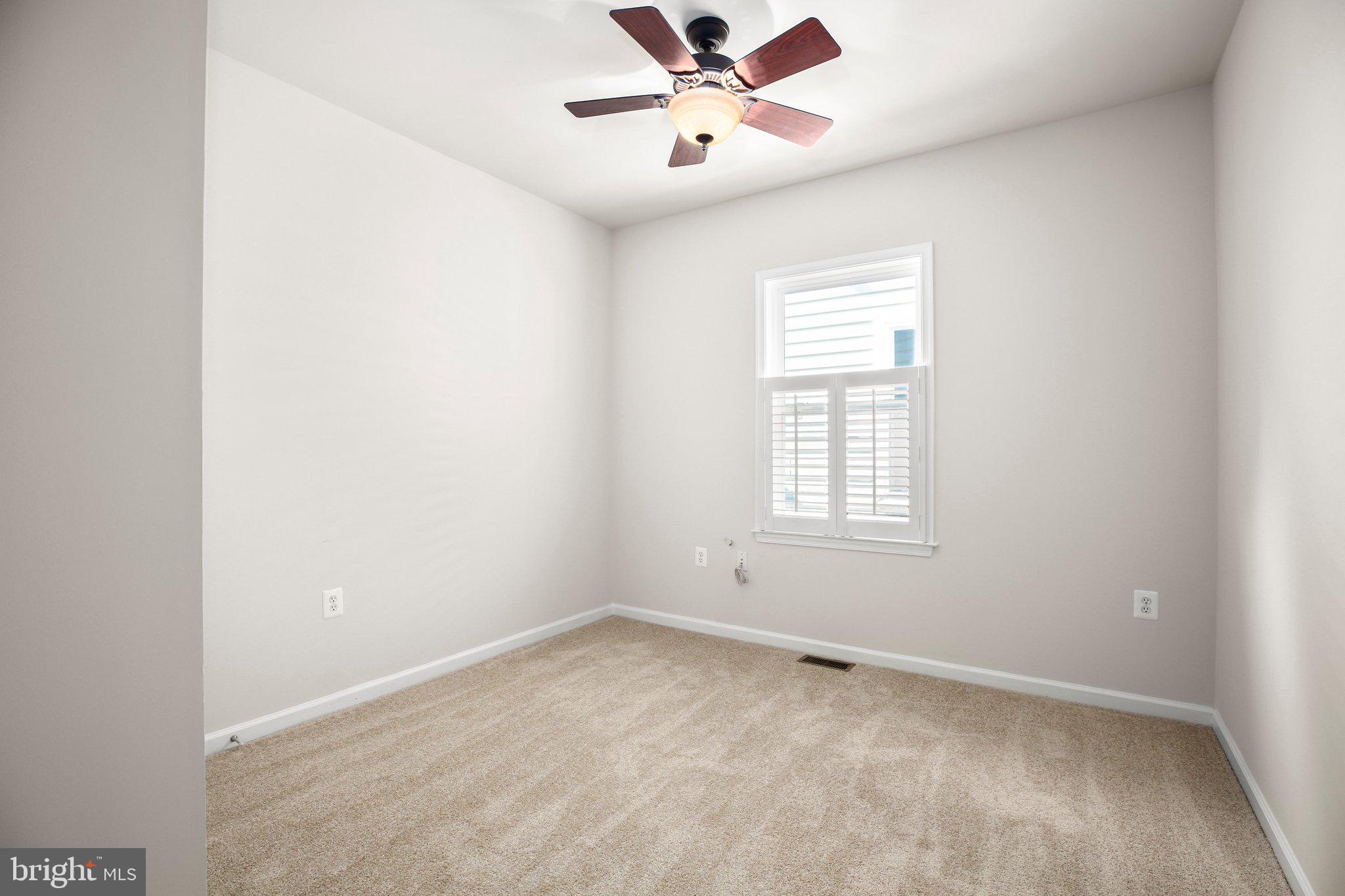 14 Sugargrove Court Fredericksburg, VA 22406 - Photo 26 of 63 an empty room with a window and a fan