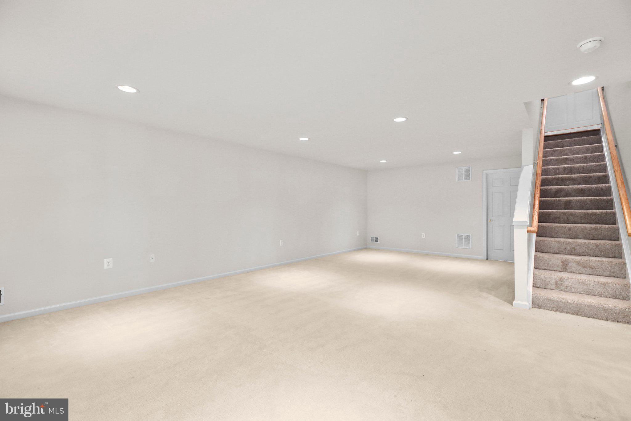 14 Sugargrove Court Fredericksburg, VA 22406 - Photo 30 of 63 a view of an empty room with stairs and ventilation