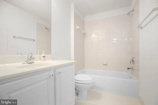 a front view of a house with trees