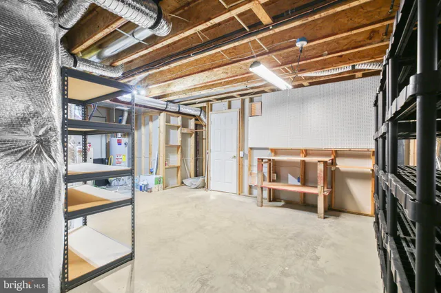 a front view of residential houses with yard and green space