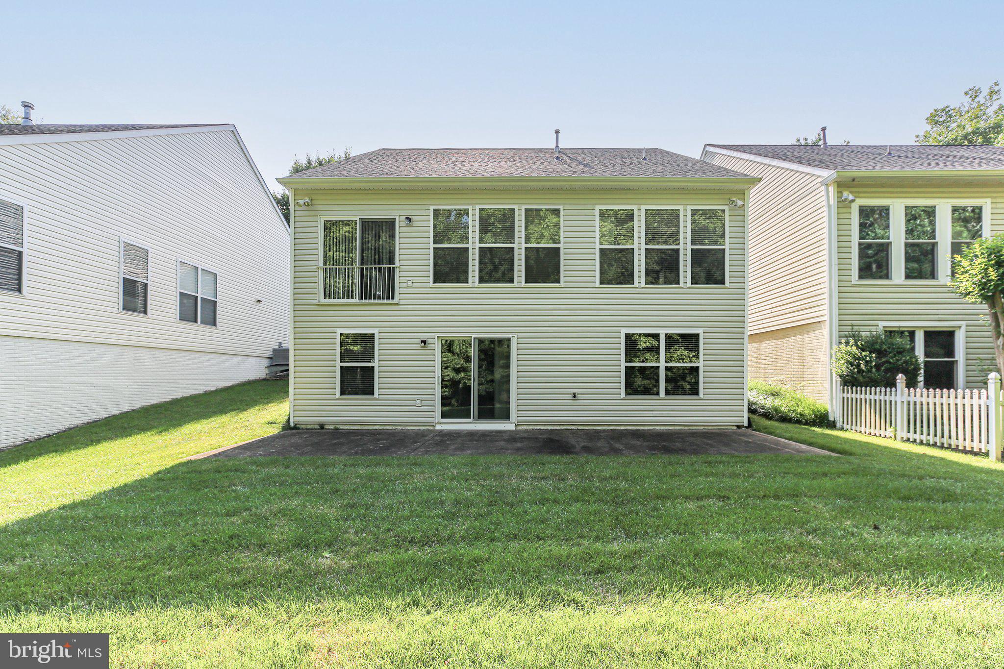14 Sugargrove Court Fredericksburg, VA 22406 - Photo 43 of 63 a large building with a big yard and large trees