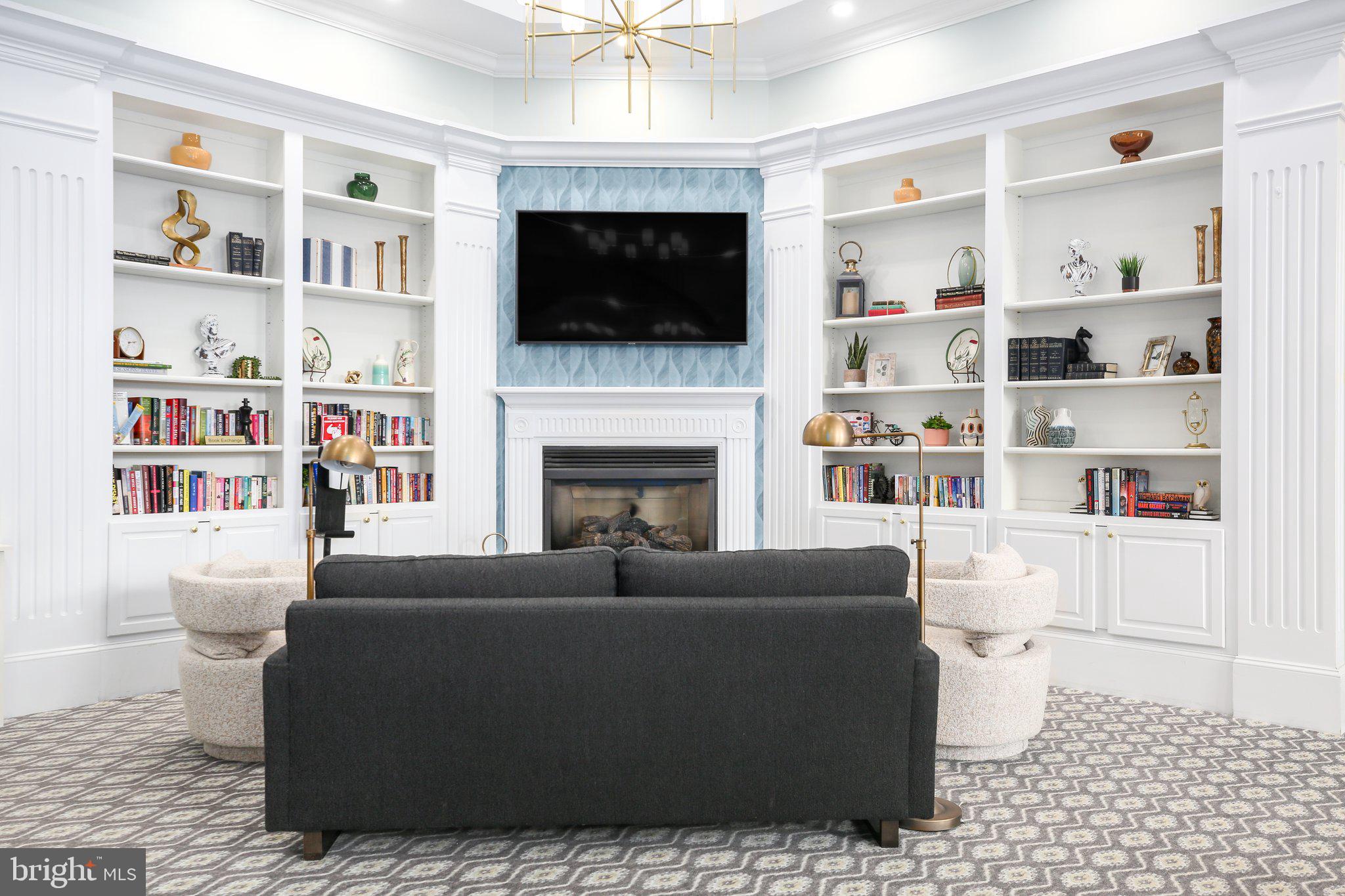 14 Sugargrove Court Fredericksburg, VA 22406 - Photo 51 of 63 a living room with furniture fireplace and a flat screen tv