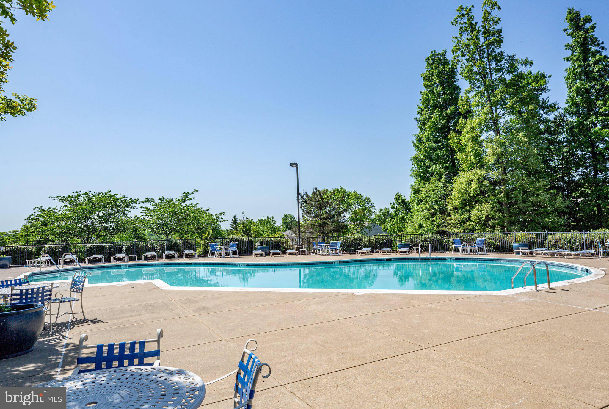 14 Sugargrove Court Fredericksburg, VA 22406 - Photo 60 of 63 a view of a swimming pool with an outdoor seating and a yard