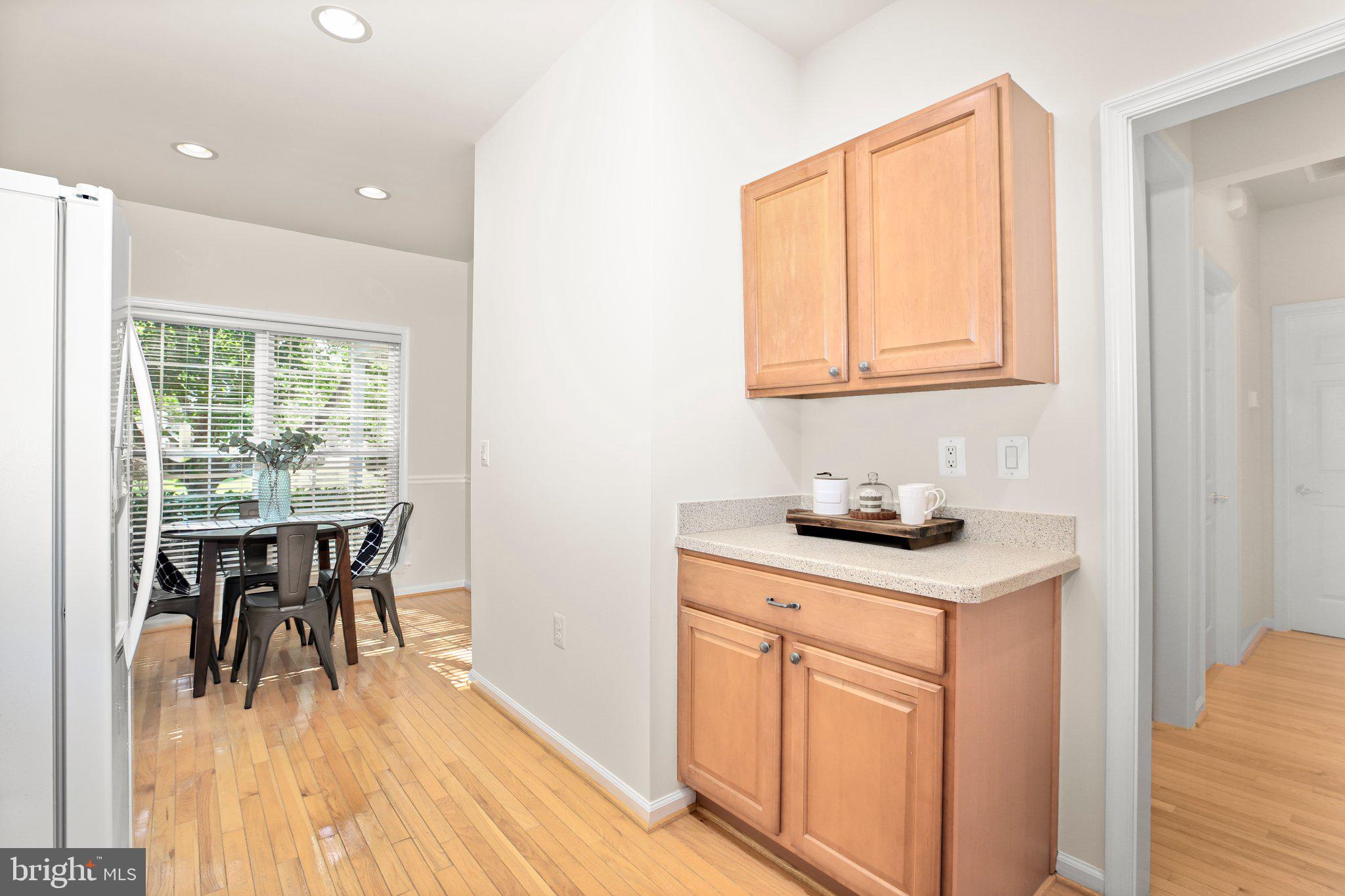 14 Sugargrove Court Fredericksburg, VA 22406 - Photo 6 of 63 a kitchen with appliances cabinets and wooden floor