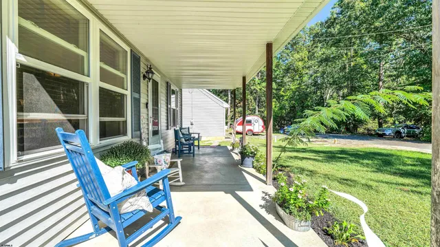a view of an outdoor sitting area with chairs