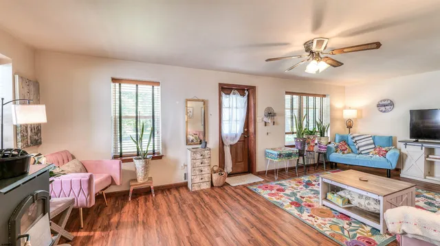a bedroom with furniture and a window