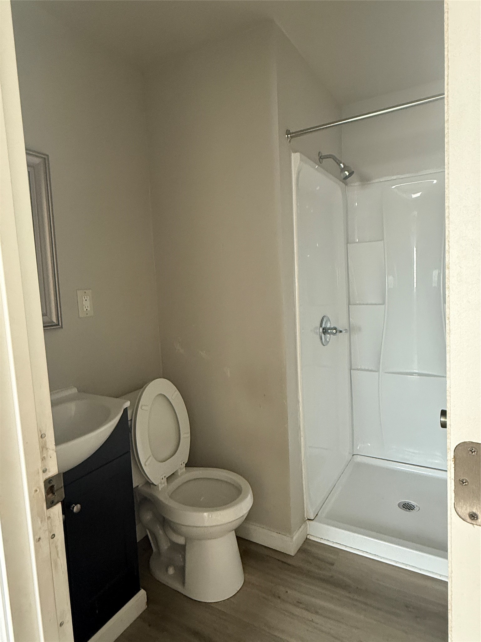 8510 Safeguard Street, Unit 3 Houston, TX 77051 - Photo 6 of 13 a white toilet sitting next to a bathroom sink