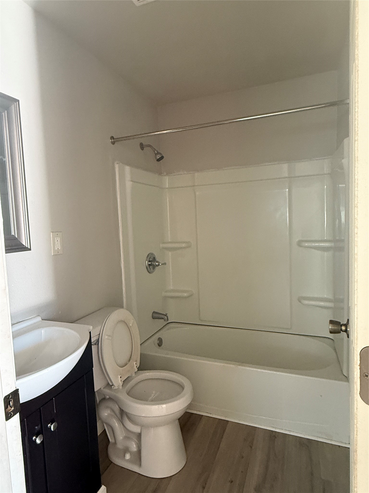 8510 Safeguard Street, Unit 3 Houston, TX 77051 - Photo 7 of 13 a bathroom with a sink a toilet and shower