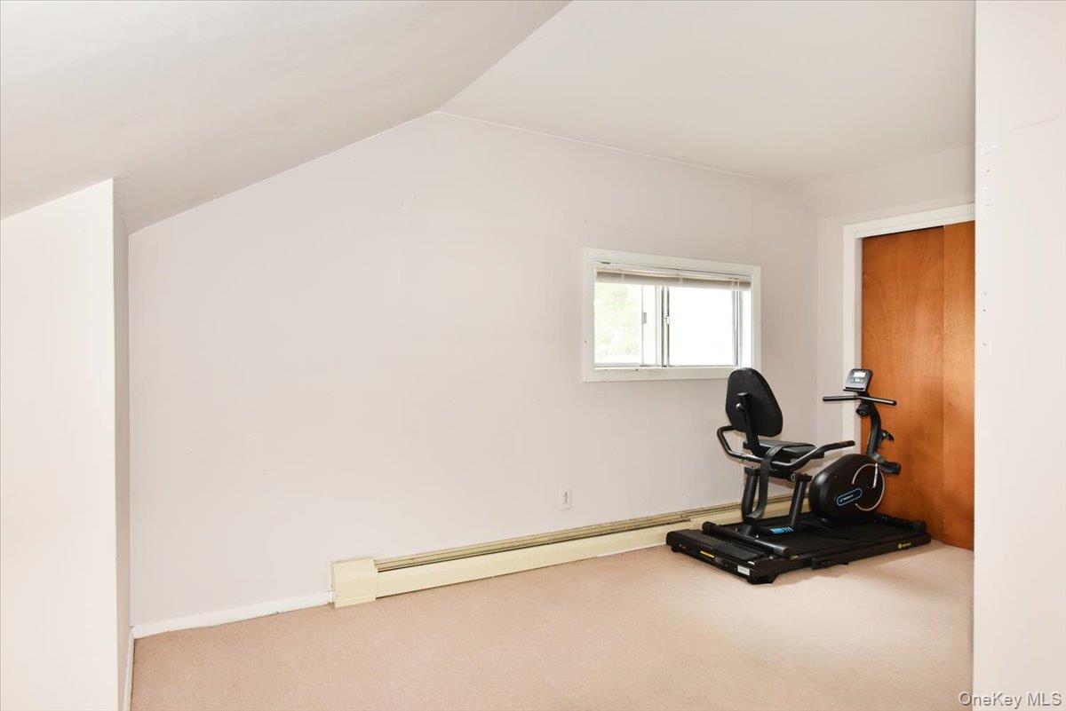 307 Blacksmith Road Levittown, NY 11756 - Photo 19 of 27 a view of workspace with gym equipment