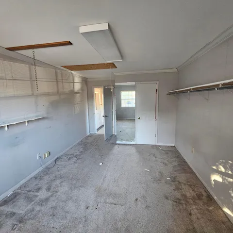 a view of a room with rack on the wall