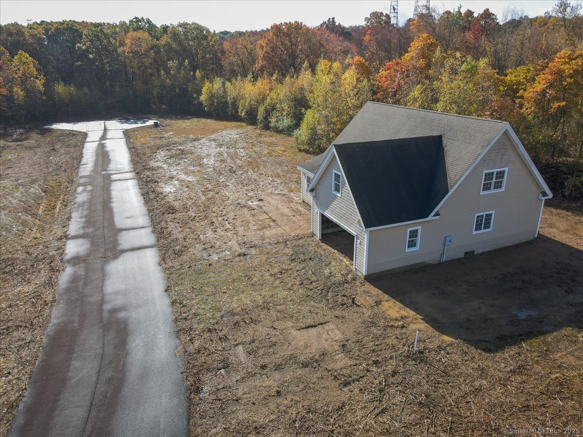 215 Chamberlain Hill Road Haddam, CT 06441 - Photo 10 of 11 a front view of a house with a yard