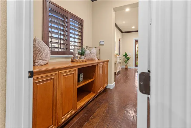 a bed room with a bed and a chair