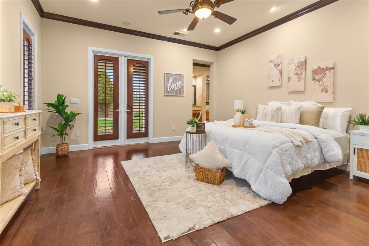 3168 Hutton Place Tracy, CA 95377 - Photo 42 of 94 a bedroom with bed and wooden floor