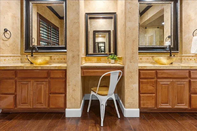 a view of a backyard with large trees and plants