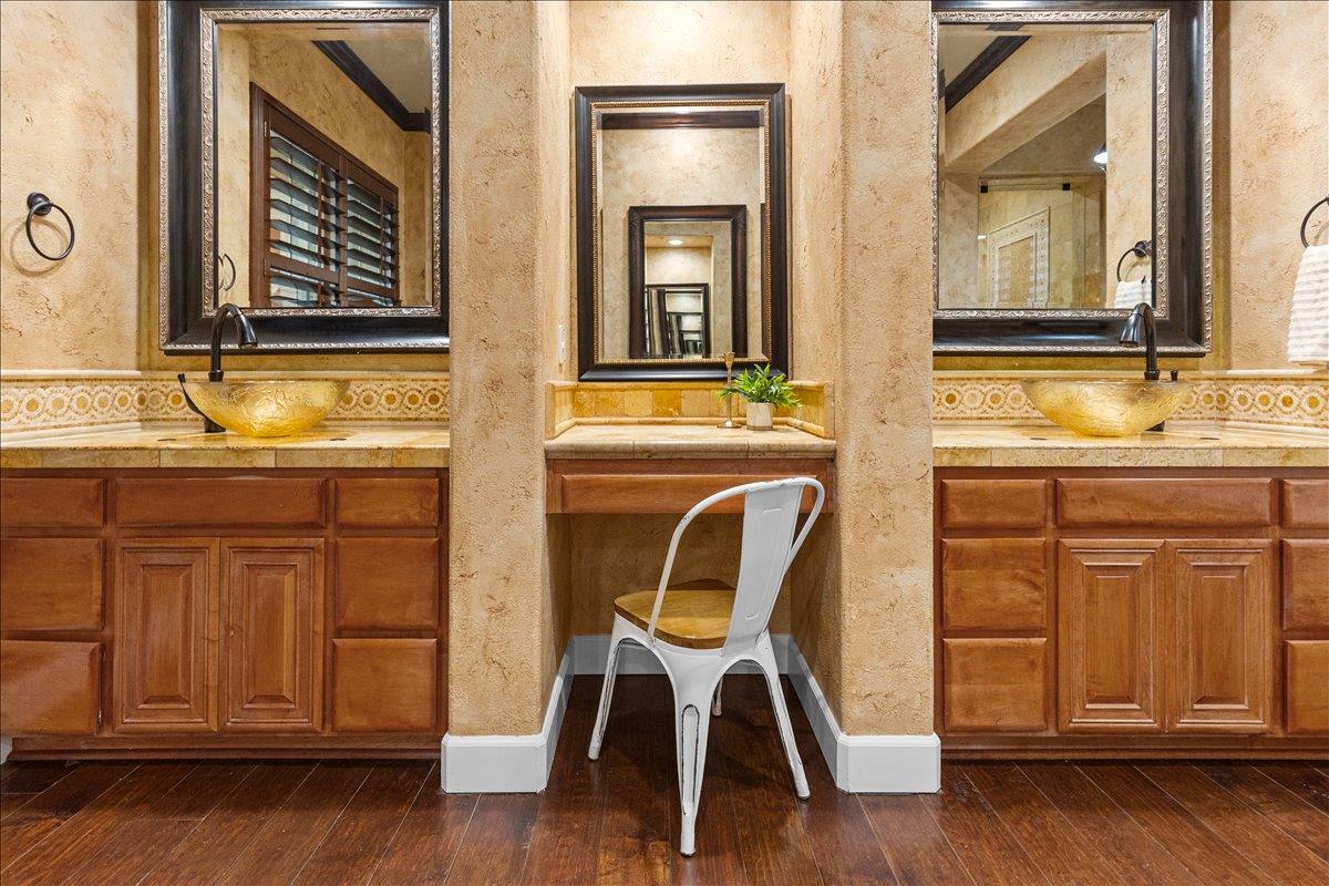 3168 Hutton Place Tracy, CA 95377 - Photo 45 of 94 a view of a kitchen with wooden floor and cabinets