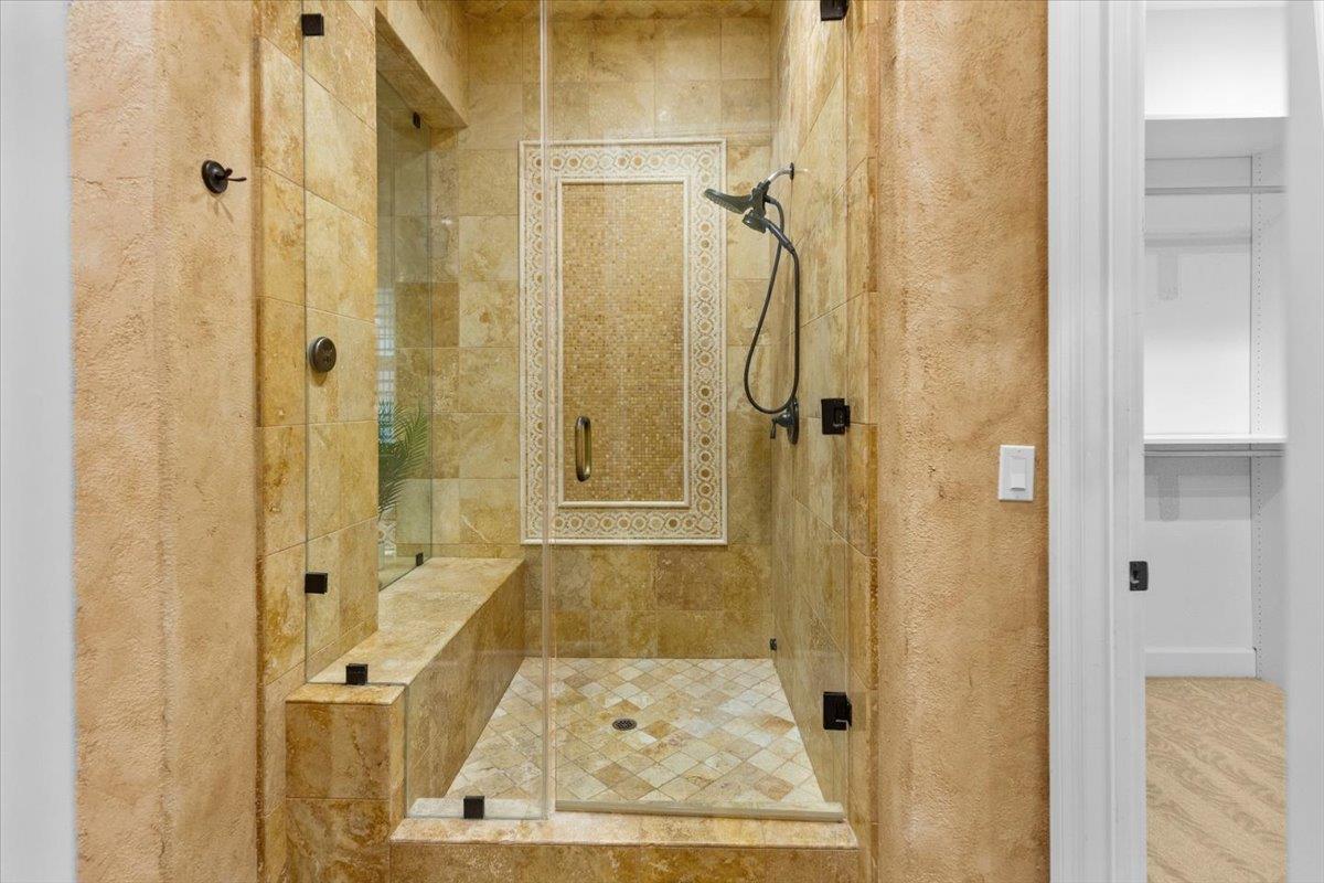 3168 Hutton Place Tracy, CA 95377 - Photo 49 of 94 a bathroom with a glass shower door