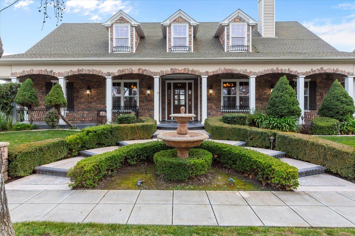 3168 Hutton Place Tracy, CA 95377 - Photo 6 of 94 front view of a brick house with a yard