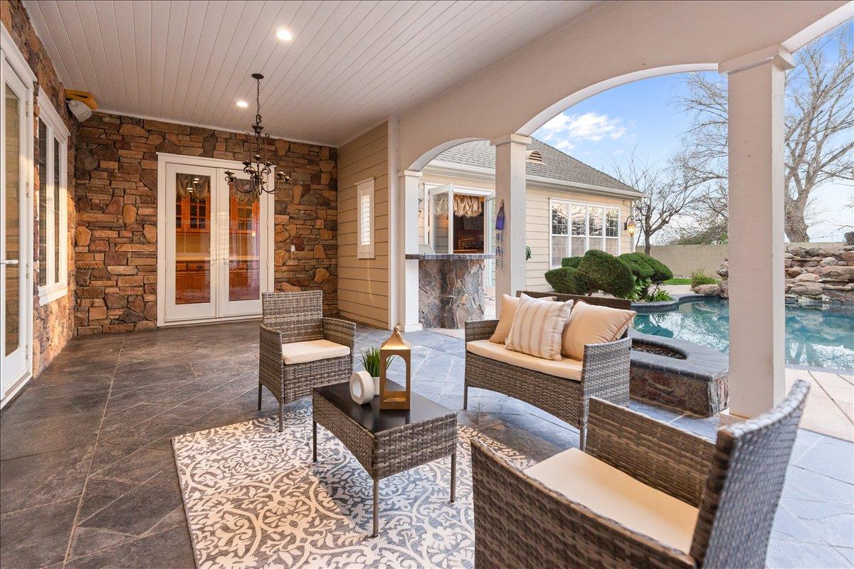 3168 Hutton Place Tracy, CA 95377 - Photo 70 of 94 a living room with furniture and a large window