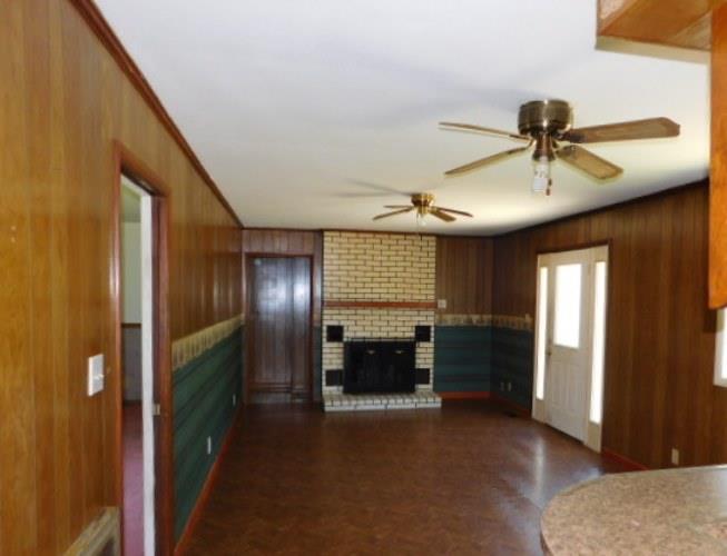290 Bobby Hayes Road Dowelltown, TN 37059 - Photo 3 of 18 a view of a livingroom with a ceiling fan window and a kitchen