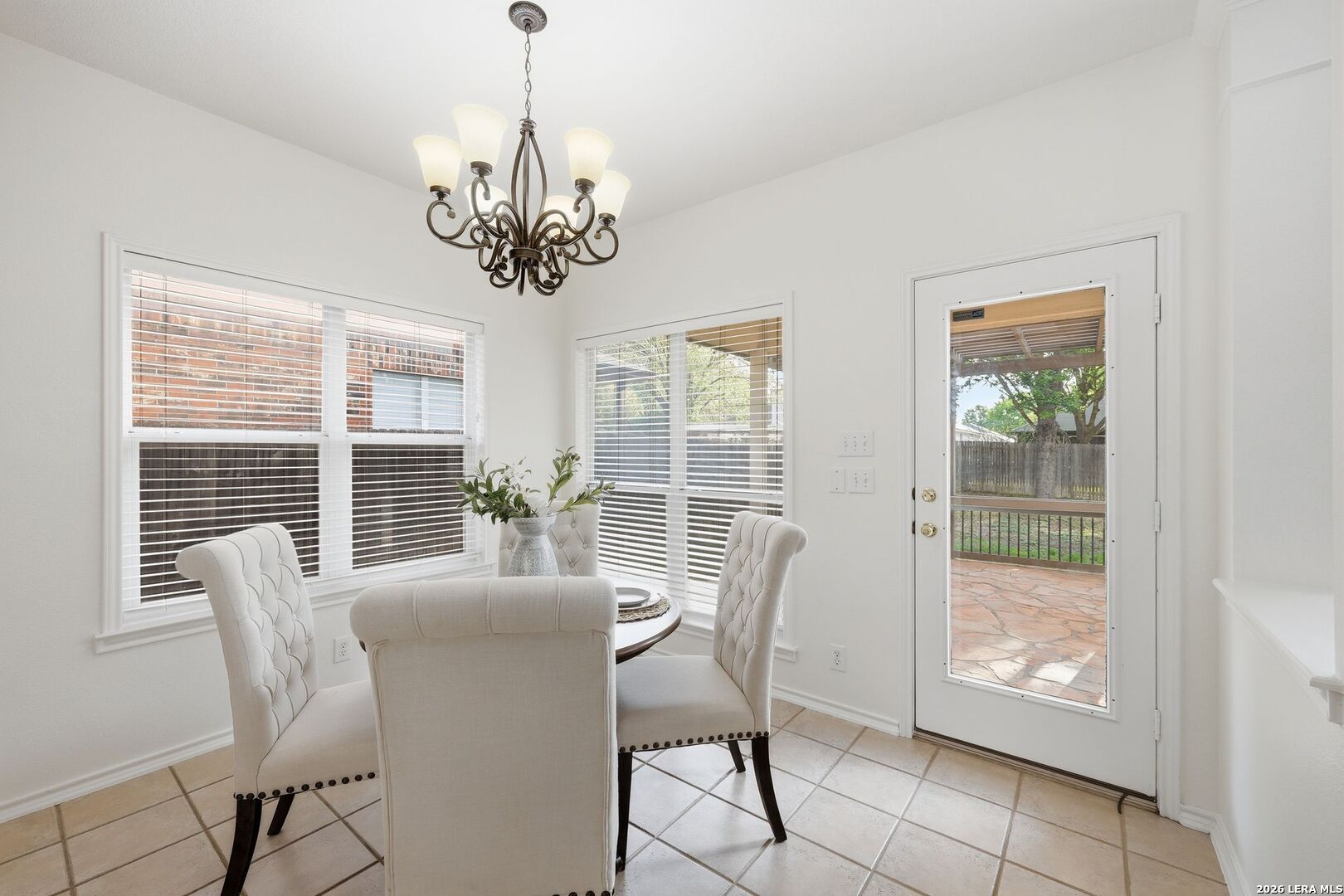 12910 Green Cedar Helotes, TX 78023 - Photo 14 of 65 a dining room with furniture and window
