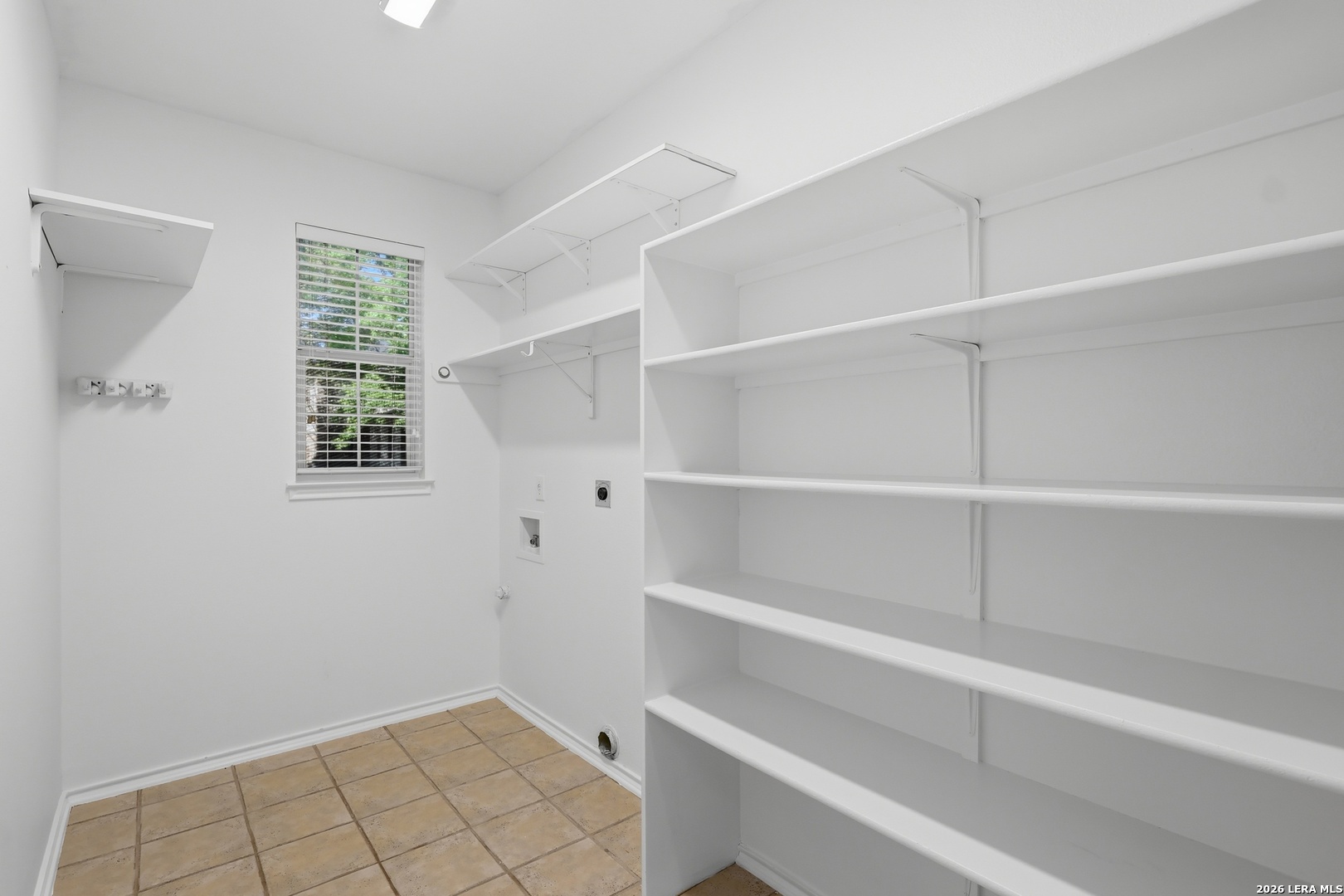 12910 Green Cedar Helotes, TX 78023 - Photo 16 of 65 a view of an empty room with empty racks
