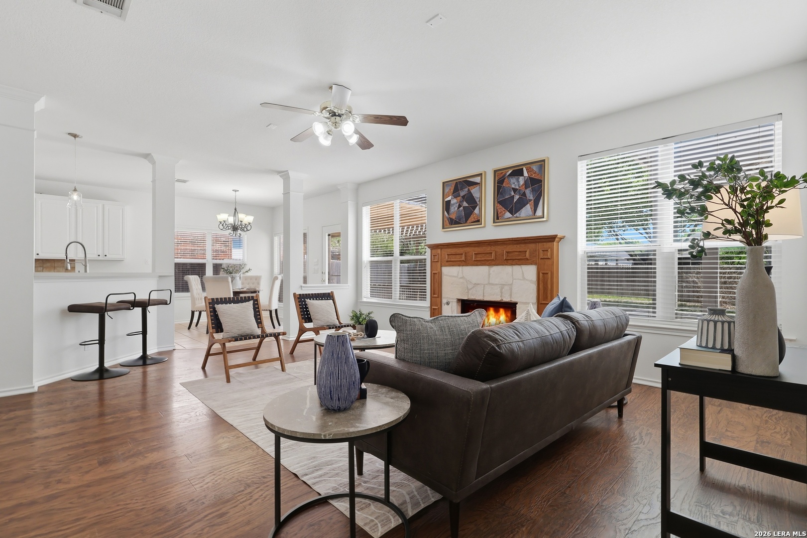 12910 Green Cedar Helotes, TX 78023 - Photo 19 of 65 a living room with furniture and a fireplace