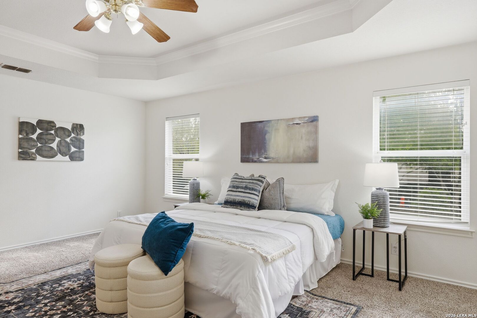 12910 Green Cedar Helotes, TX 78023 - Photo 23 of 65 a bedroom with a bed and a chandelier