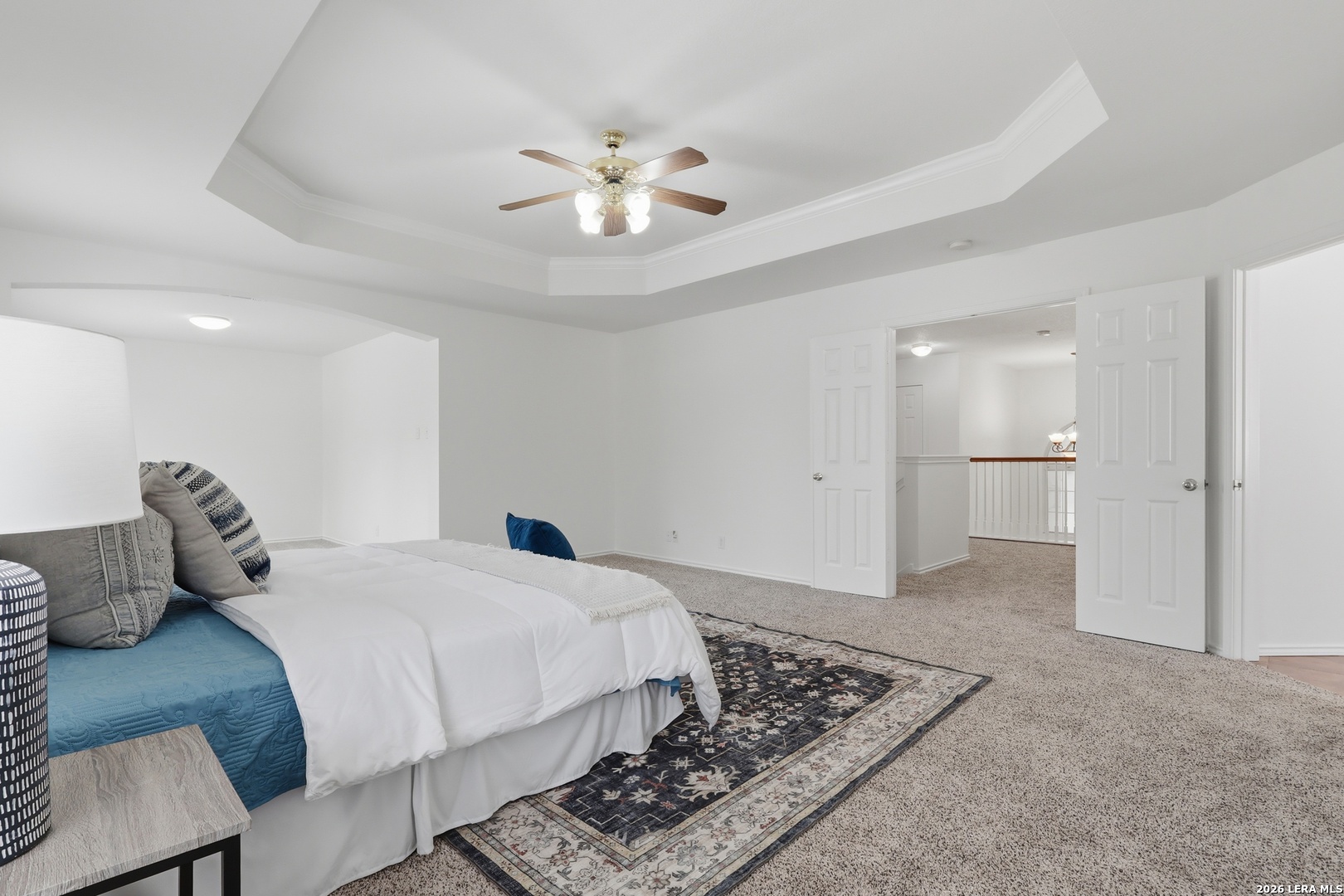 12910 Green Cedar Helotes, TX 78023 - Photo 25 of 65 a bedroom with a bed and mirror