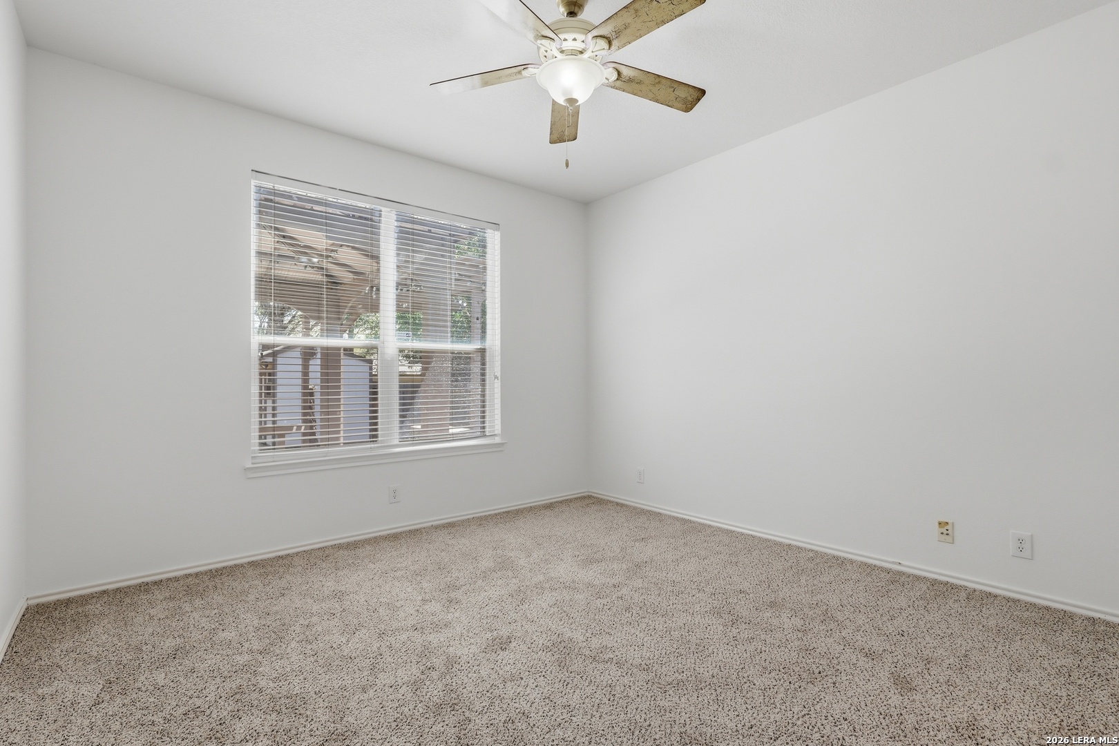 12910 Green Cedar Helotes, TX 78023 - Photo 36 of 65 a view of an empty room with a window