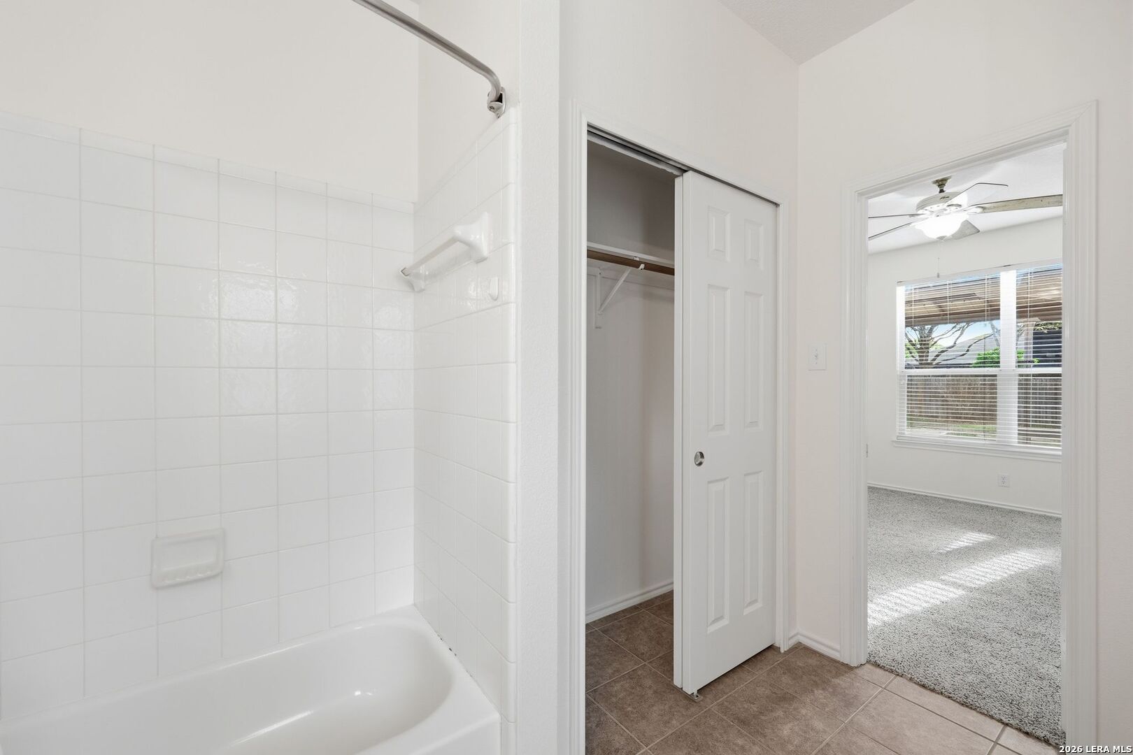 12910 Green Cedar Helotes, TX 78023 - Photo 41 of 65 a bathroom with a bathtub and shower