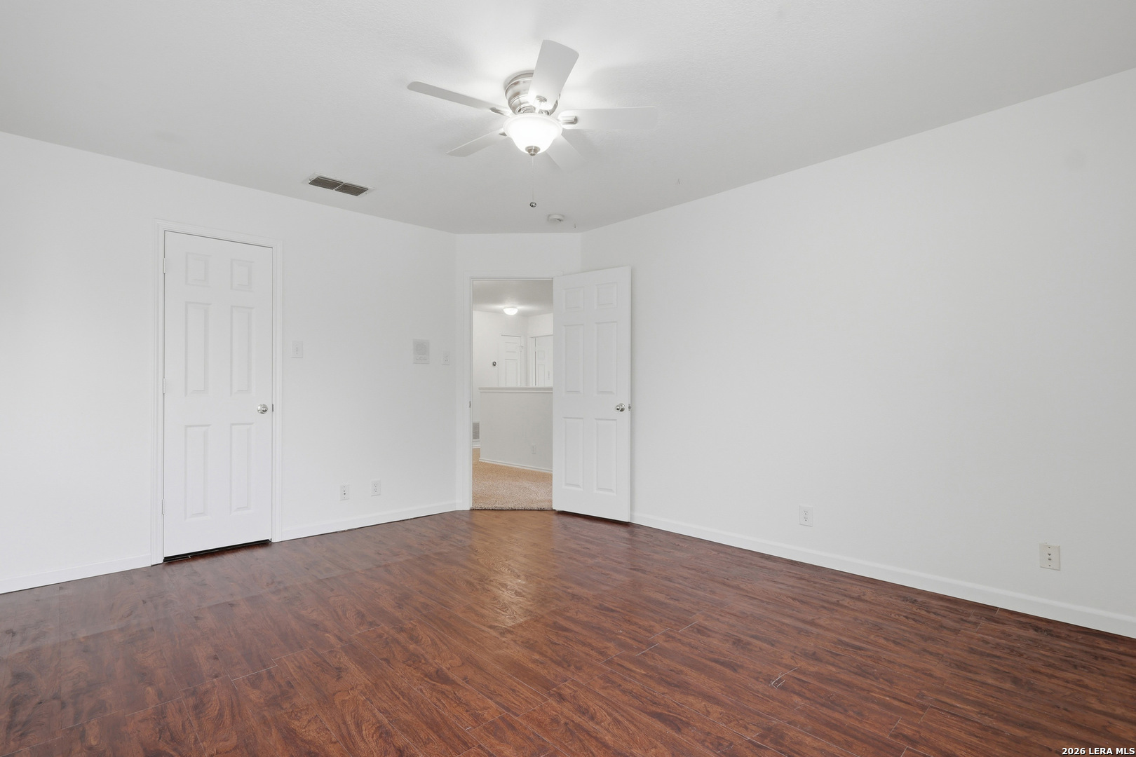 12910 Green Cedar Helotes, TX 78023 - Photo 45 of 65 a view of an empty room with wooden floor