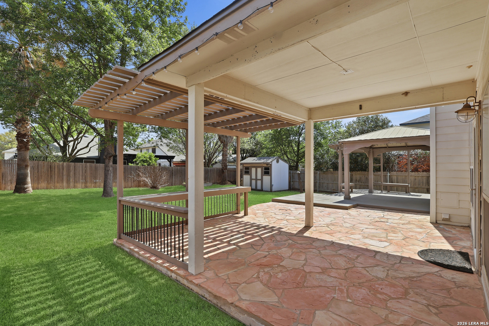 12910 Green Cedar Helotes, TX 78023 - Photo 50 of 65 a view of a house with backyard and porch
