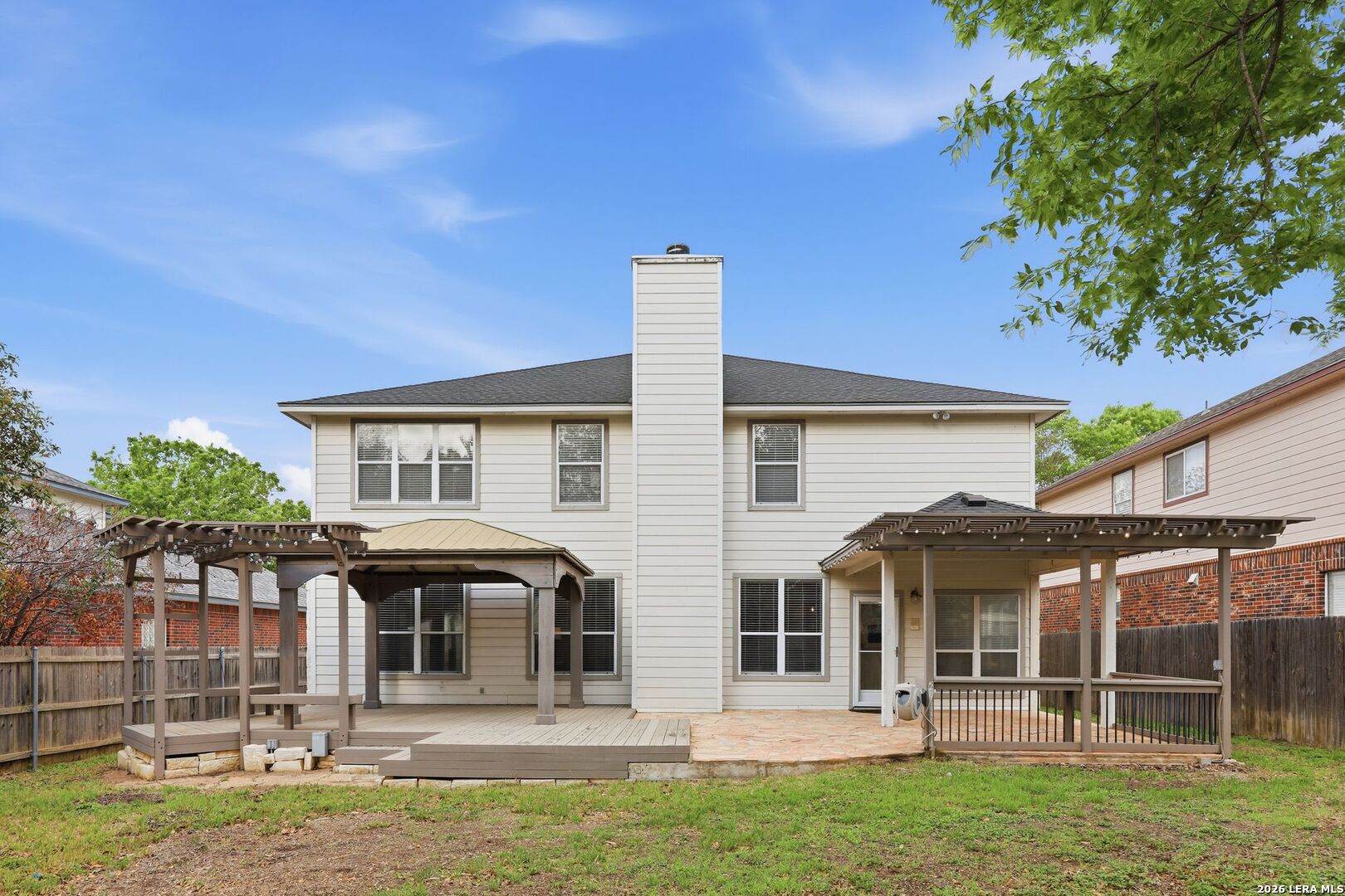 12910 Green Cedar Helotes, TX 78023 - Photo 54 of 65 front view of a house with a yard