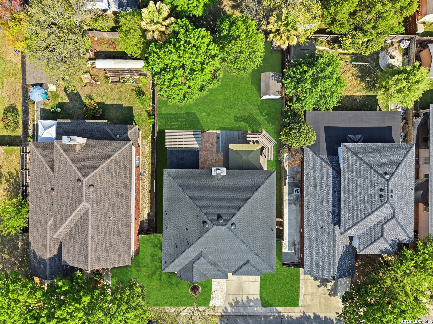 12910 Green Cedar Helotes, TX 78023 - Photo 55 of 65 an aerial view of a house with garden space and street view