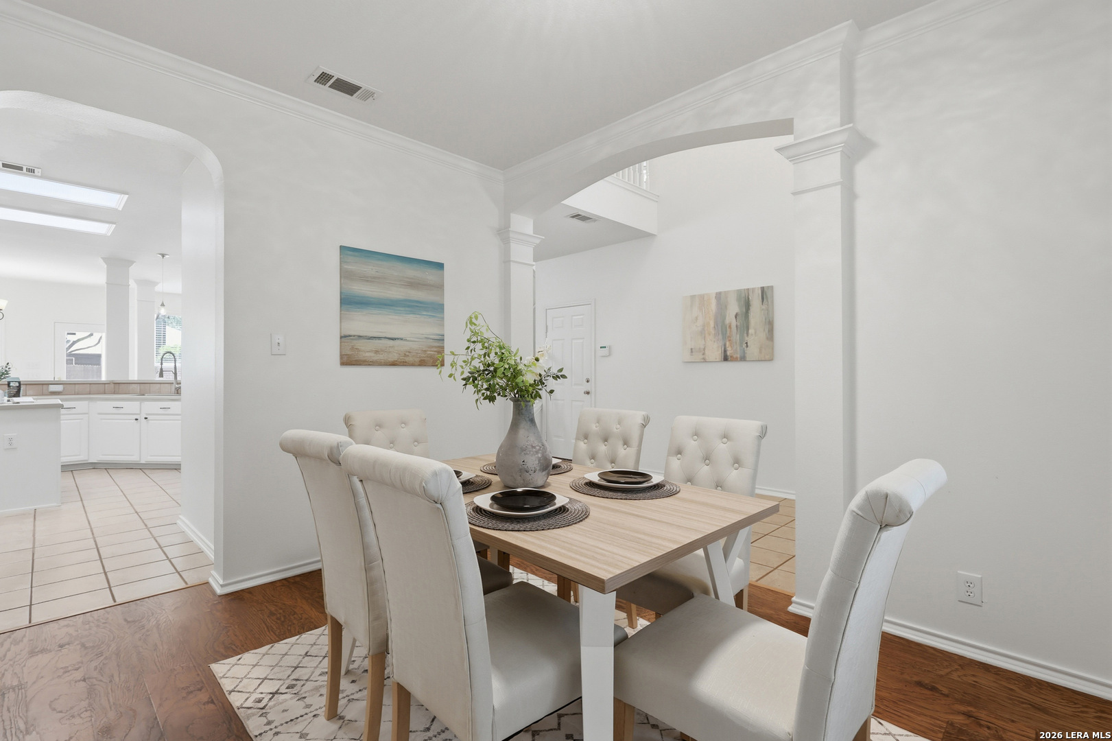 12910 Green Cedar Helotes, TX 78023 - Photo 7 of 65 a view of a dining room with furniture and wooden floor